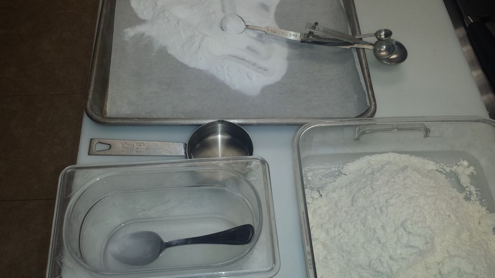 Measure out your ingredients, dissolve the 4 teaspoons of Sodium Carbonate in the hot water, then combine with cold. Add flour to mixing bowl with hook and add the water.