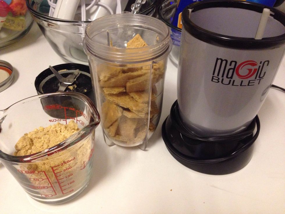 Measure out your pre-purchased graham cracker crumbs or blend your own (I love using my Magic Bullet for this step)!