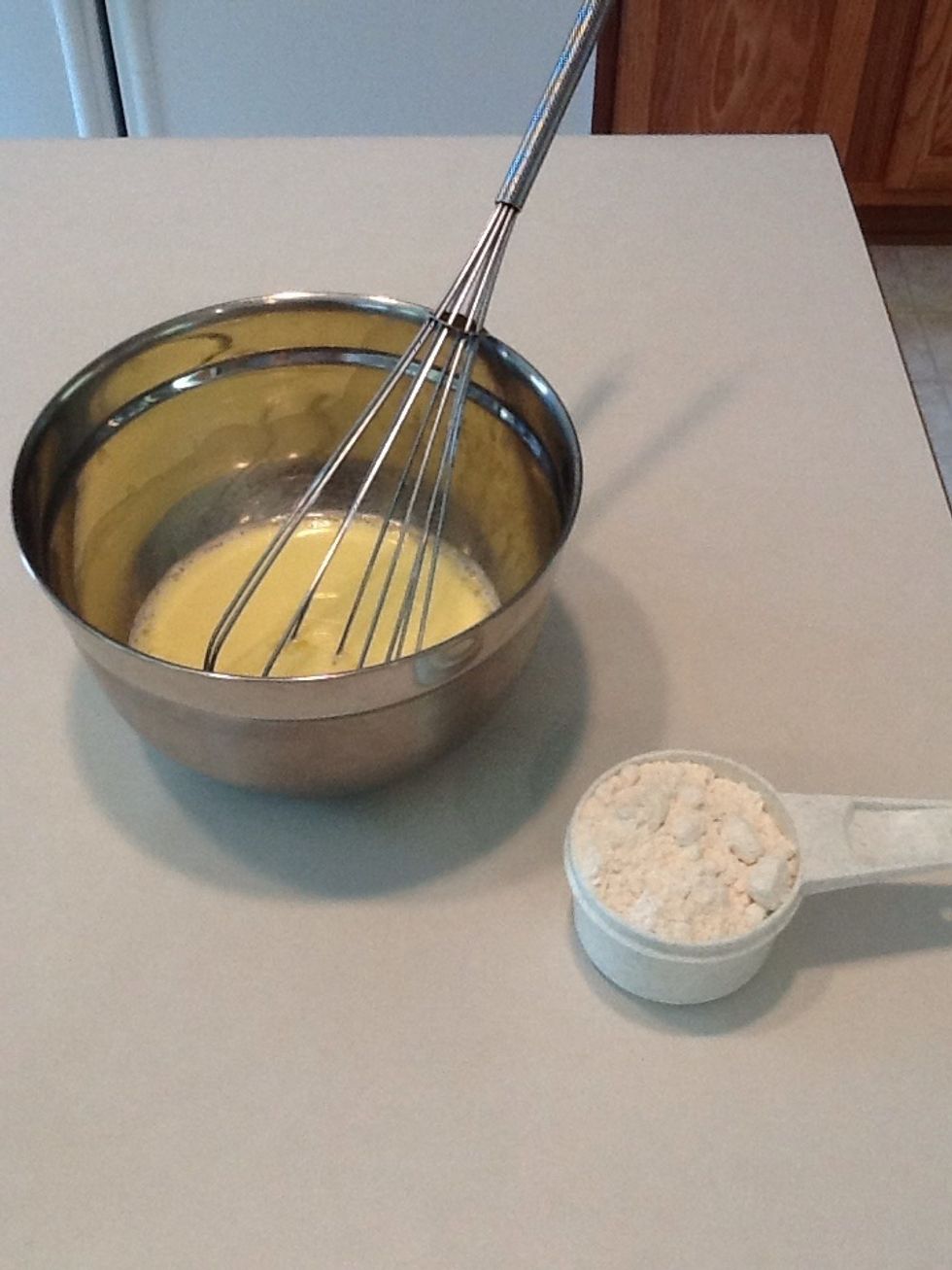 Measure pancake batter.