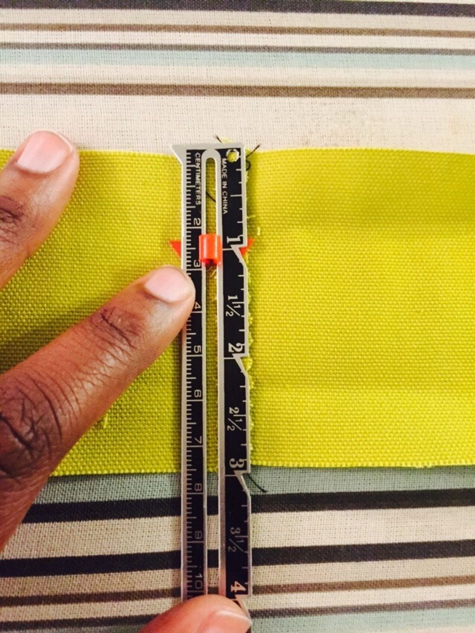 Measure straps and fold sides evenly into each other.