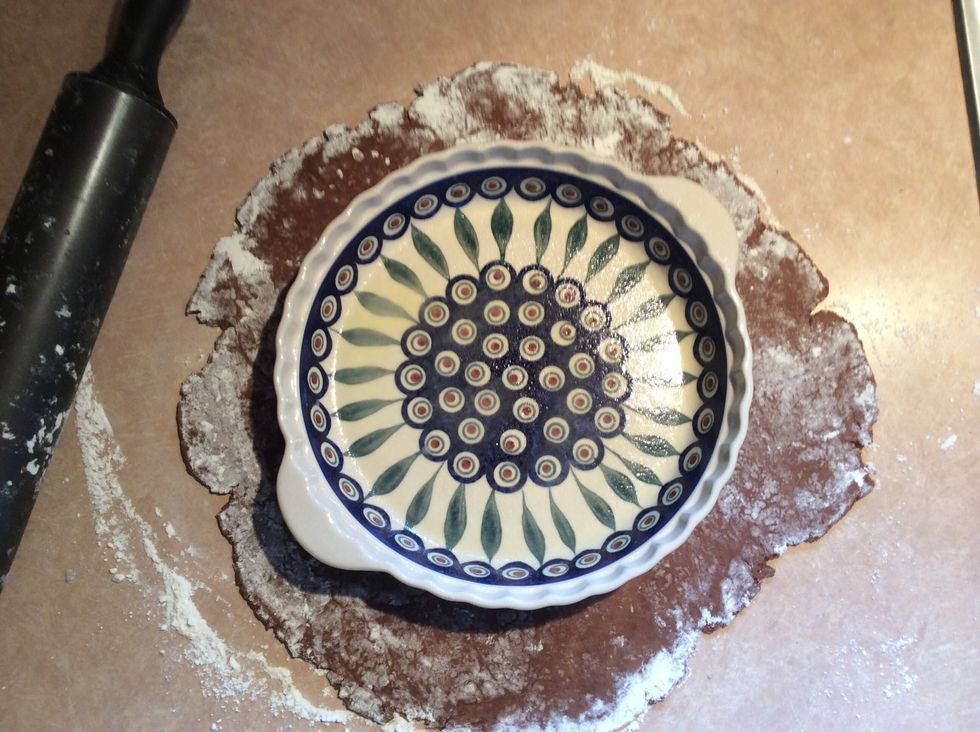 Measure the dough using the pie plate to make sure that the dough you roll is large enough to fit the pie plate.