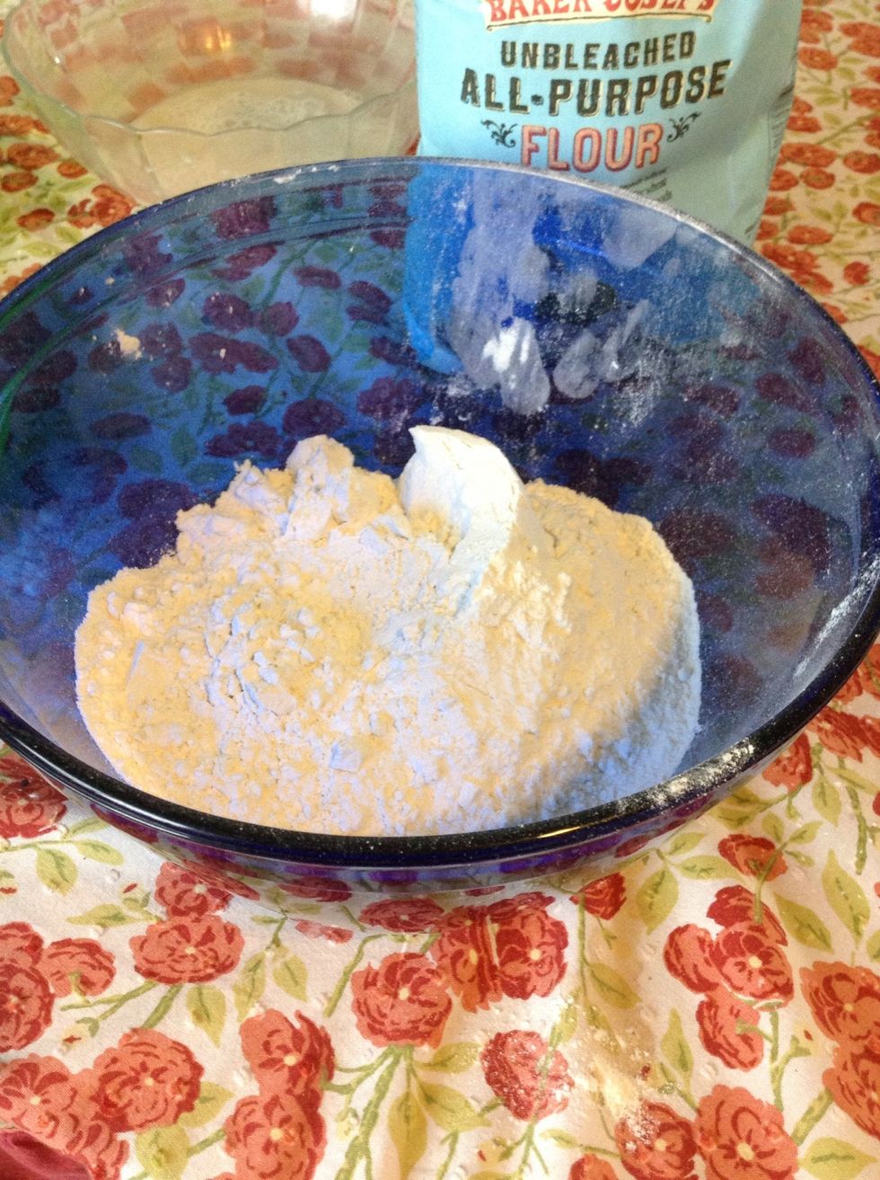 Measure the flour into a large bowl.