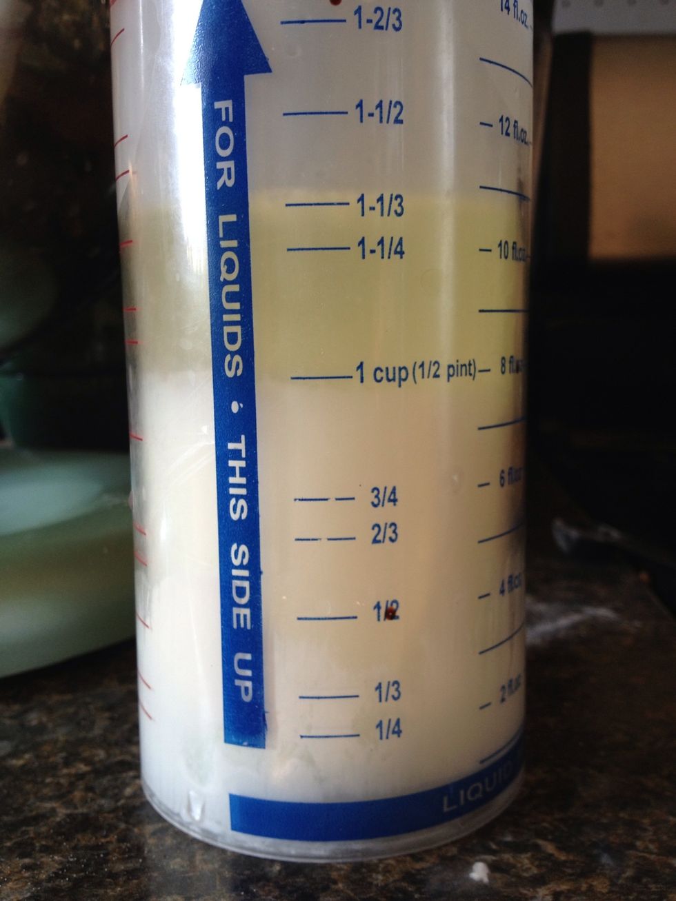 Measure the milk and water. This can be done in the same container. You can also pour the oil in as well, or you can measure them in different containers. The oil will float to the top.