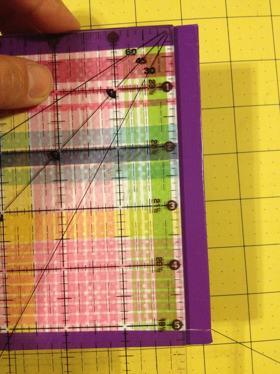 Measure the short end of your front cover. This one is 5 1/2 inches. I want my paper to be a 1/2 inch smaller so it will end up being 10 1/2 inches long. (5 1/2+ 5 1/2 = 11- 1/2= 10 1/2)