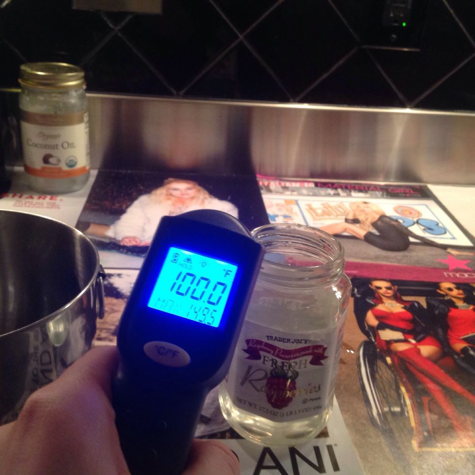 Measure the temperature of lye + water mixture and oil mixture. Wait until both mixtures are between 95 and 105 degrees Fahrenheit to proceed.