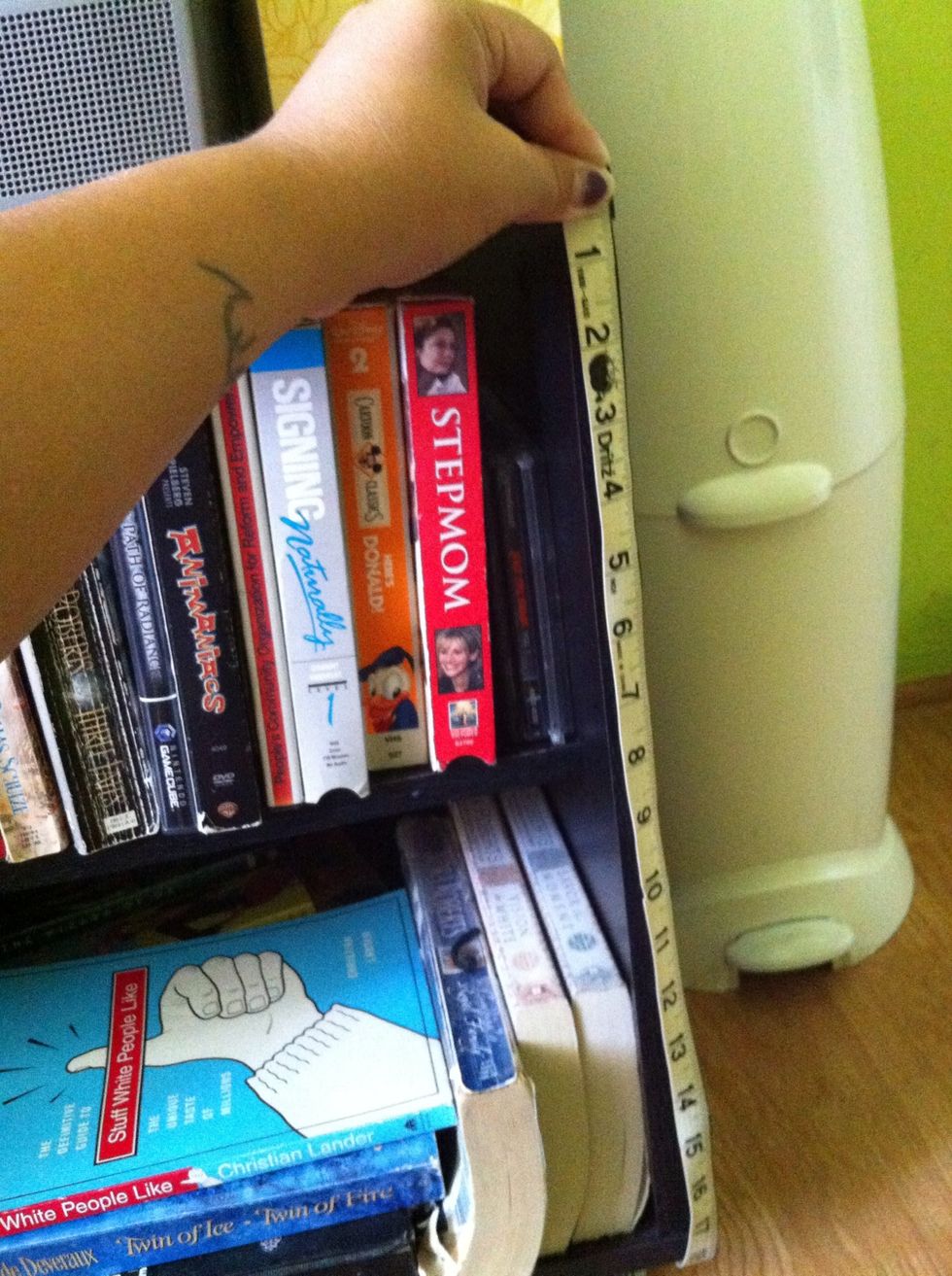 Measure the top, bottom, and sides of the front of the area you want to cover.