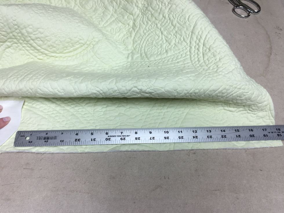 Measure the width of the side flap but only from where it wraps around the leg to the front edge.