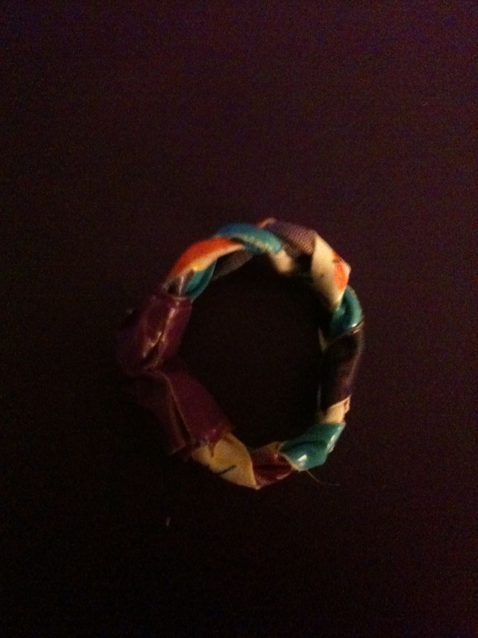 Measure to you finger and tape ends together.