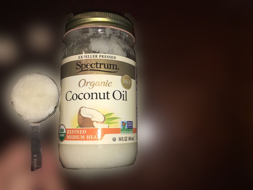 Measure two tablespoons of coconut oil.