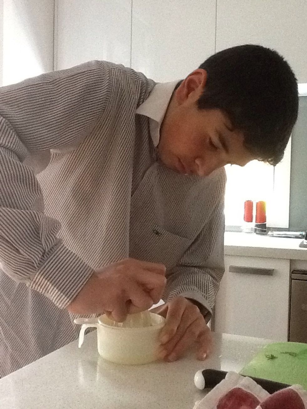 Measure two tablespoons of lemon juice into a small screw-top jar.