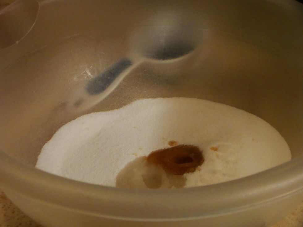 Measure your almond and vanilla extract and sugar out.Then put it all in a big bowl