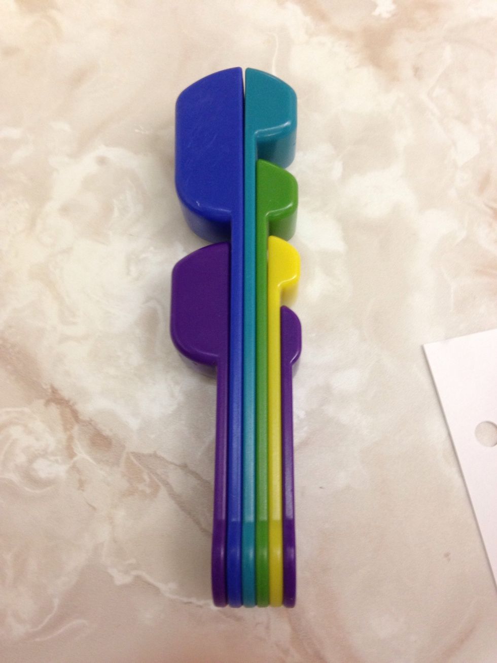 Measuring spoons are used for measuring little ingredients. I can use this to measure things like flower or sugar.