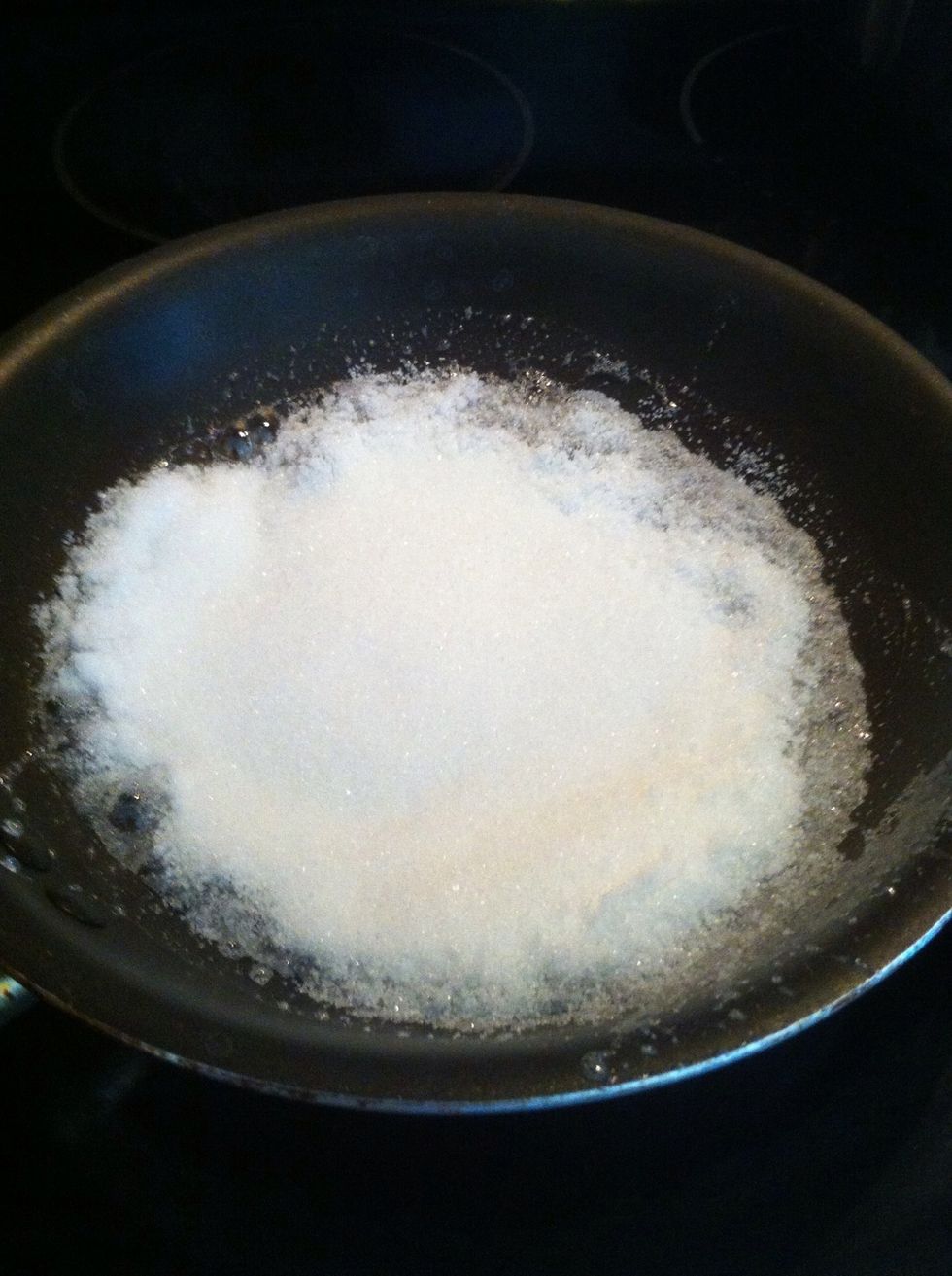 medium heat .. slow motion to the pan will make great even caramel