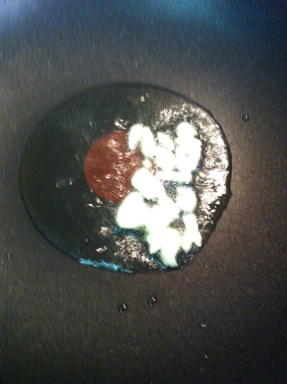 Medium heat the wok put the garlic mince in