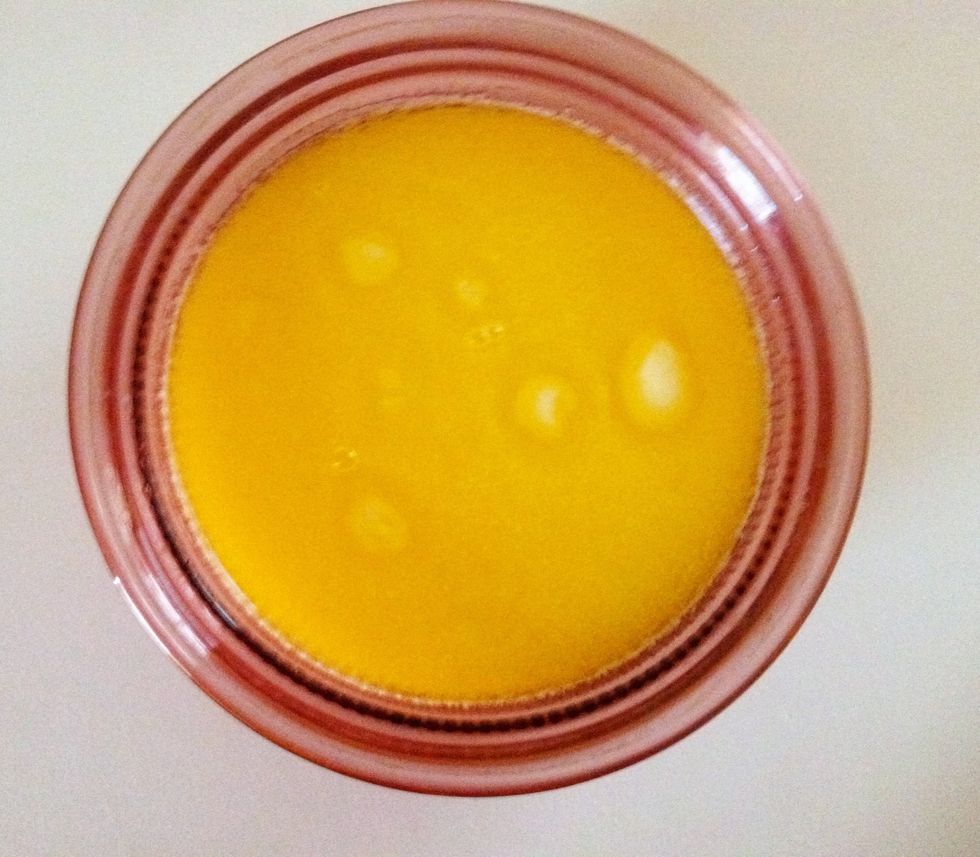 Melt 1/2 stick of butter or margarine in 1 cup of milk. Set aside to cool. Use any type of milk- skim, low-fat, whole, or buttermilk.