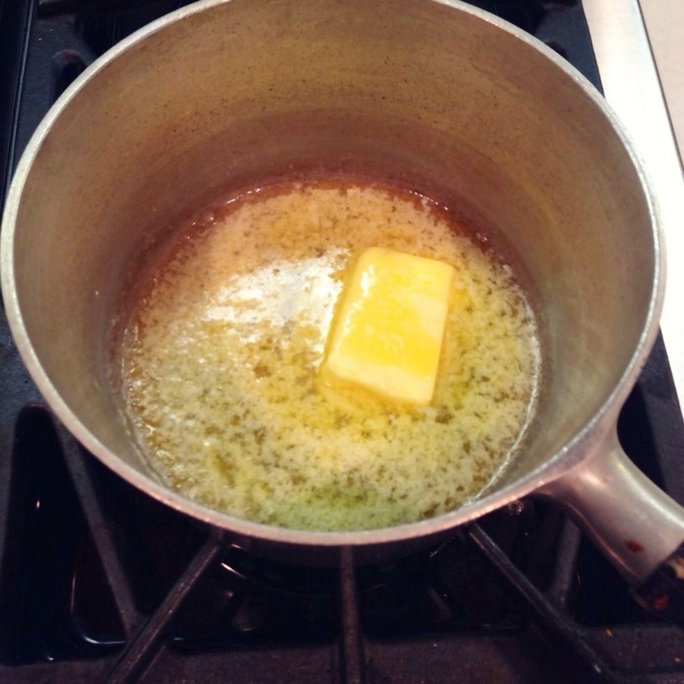 Melt 1/4 cup butter on stovetop until brown.