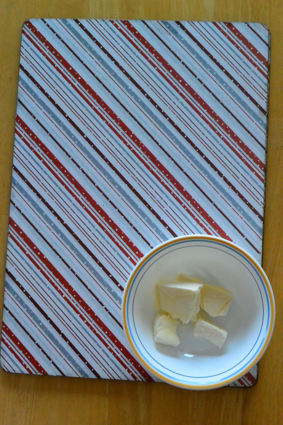 Melt 1/4 Cup of butter. Add 2 egg yolks and mix.