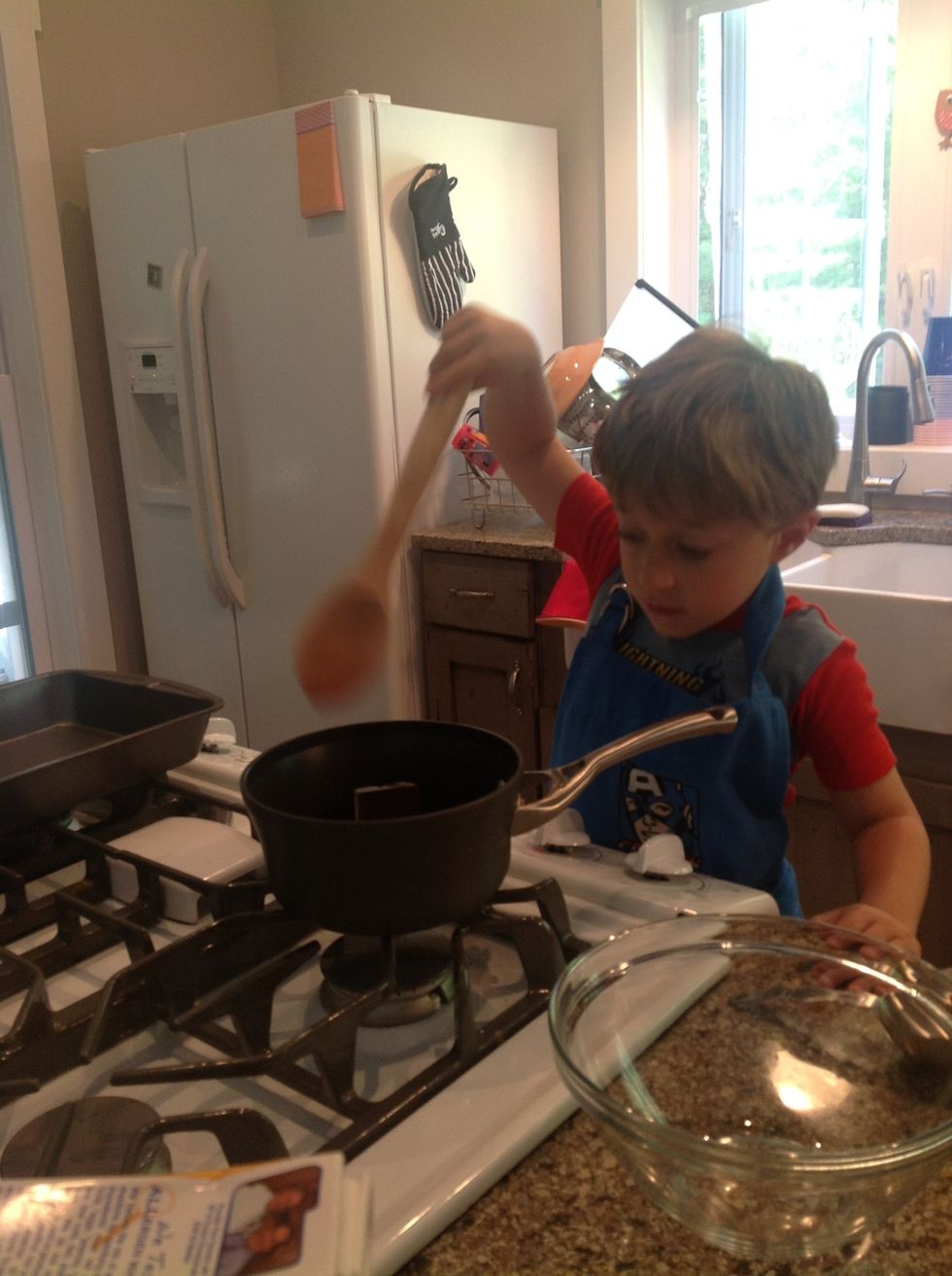 Melt 1 cup of butter and 4 ounces of unsweetened chocolate over low heat.