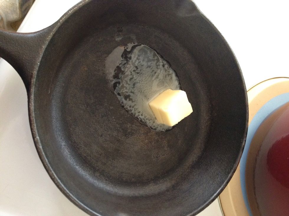 Melt 1 tablespoon of butter over medium heat.