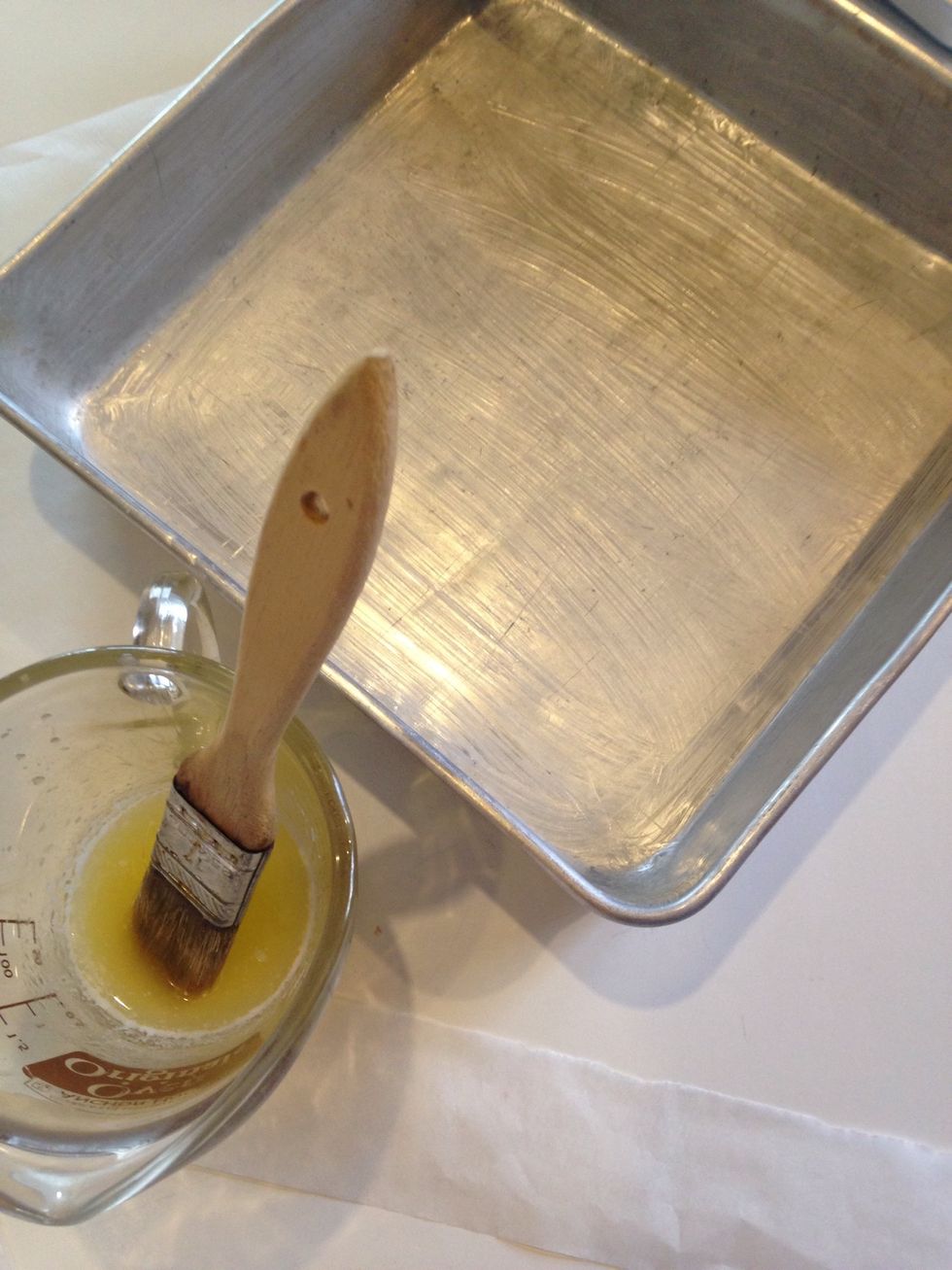 Melt 10 g butter and rush into bottom and sides of pan.