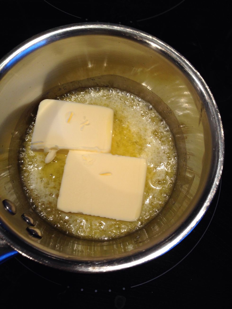 Melt 100 grams of butter and then let it cool down.