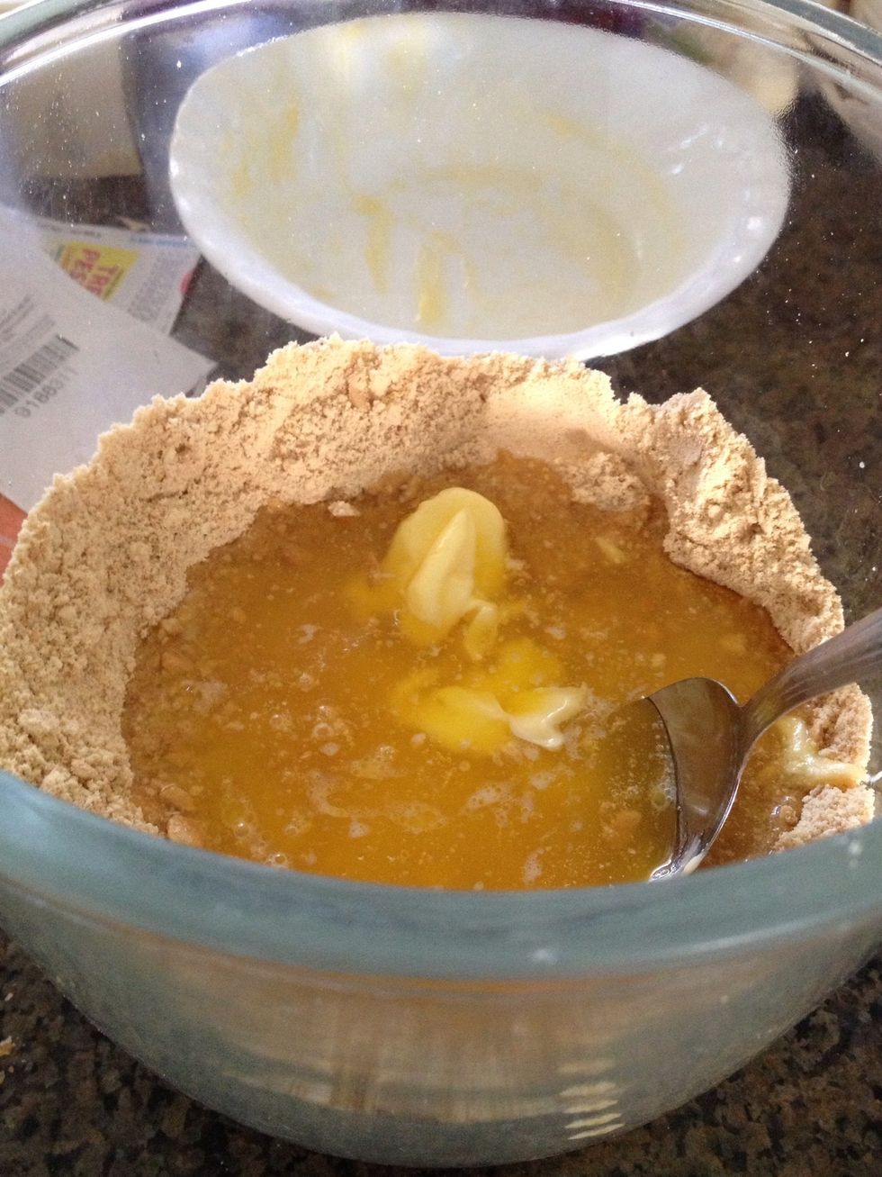 Melt 125g of butter and mix it with cookie crumbs