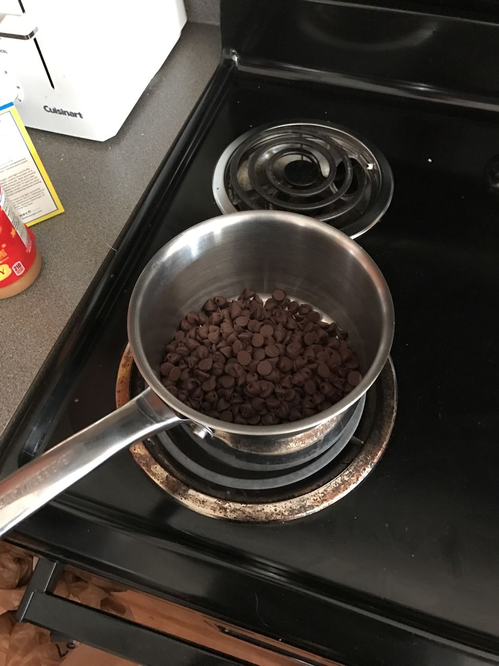 Melt 12oz of semi-sweet chocolate chips