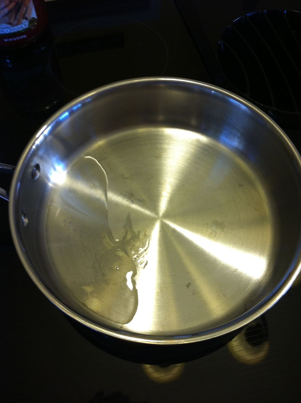 Melt a bit of coconut oil over medium heat.