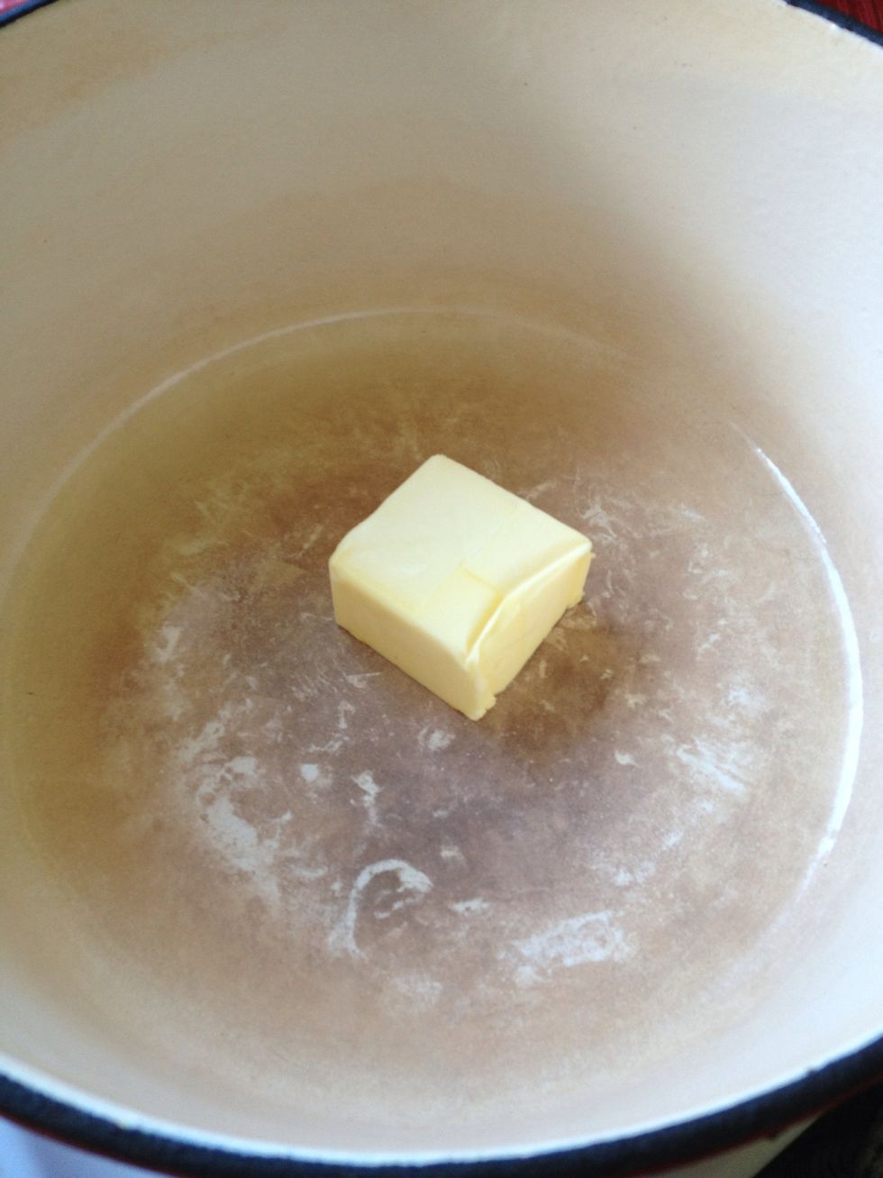 Melt a chunk of butter in a heavy pot