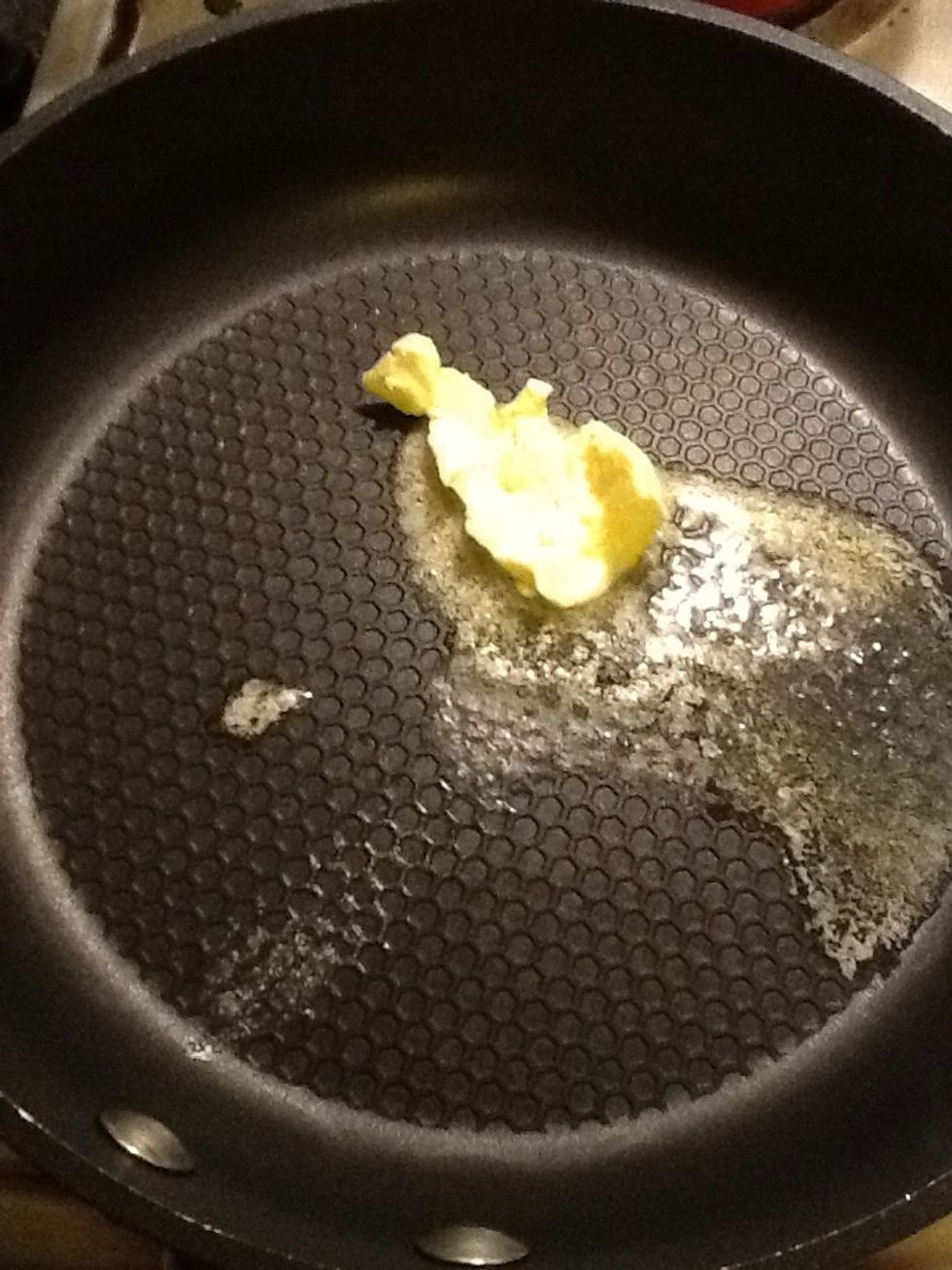 Melt a knob of butter (oil will do too)