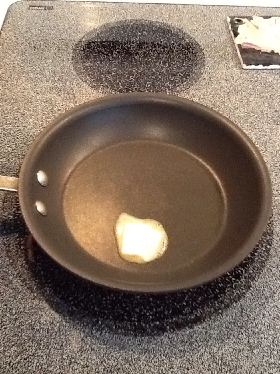 Melt a pat of butter in a saucepan over medium low heat.