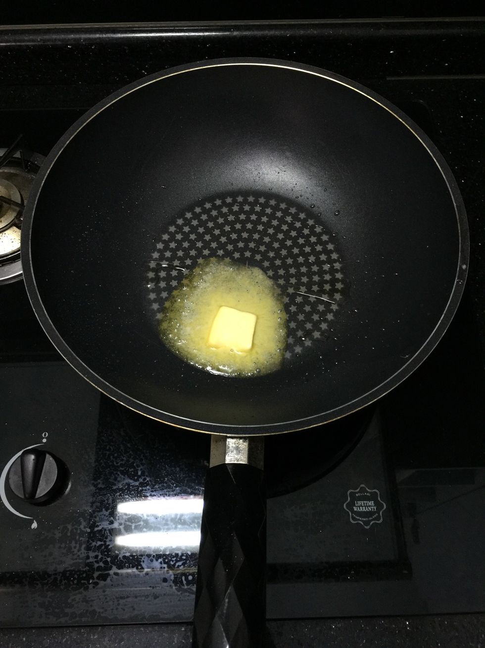 Melt a tablespoon of butter into preheated non-stick pan.