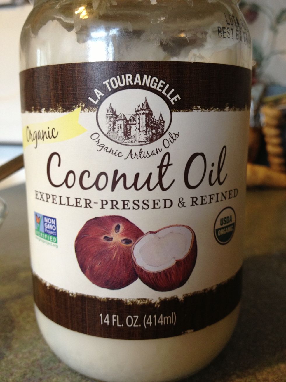 Melt a tablespoon or two of coconut oil in a small bowl.