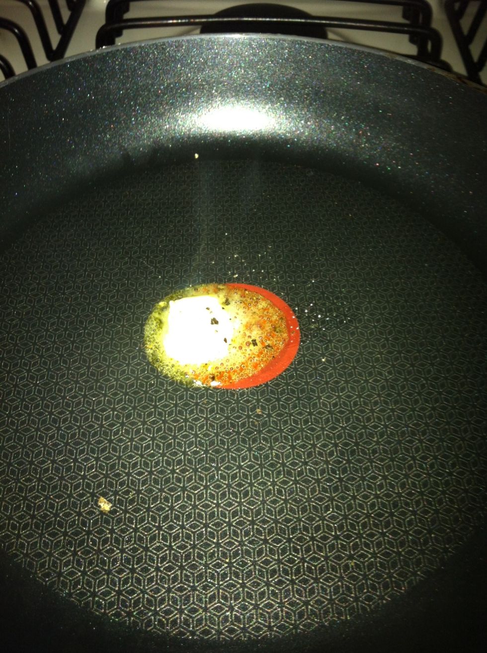 Melt about a half spoon of un salted butter with pepper