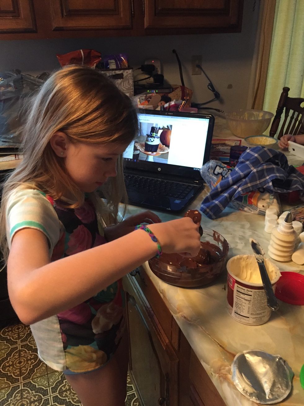 Melt Almond bark in microwave and dip marshmallows to cover