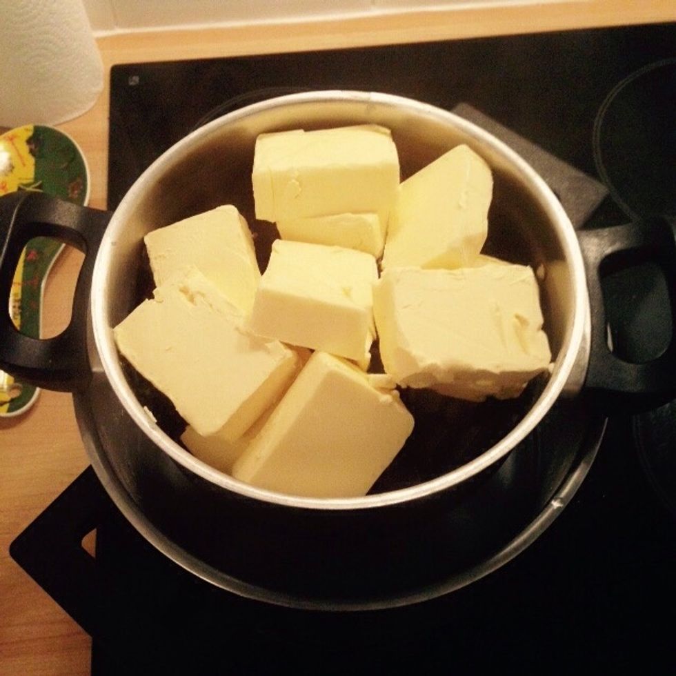 Melt both butter and chocolate gently in a water bath