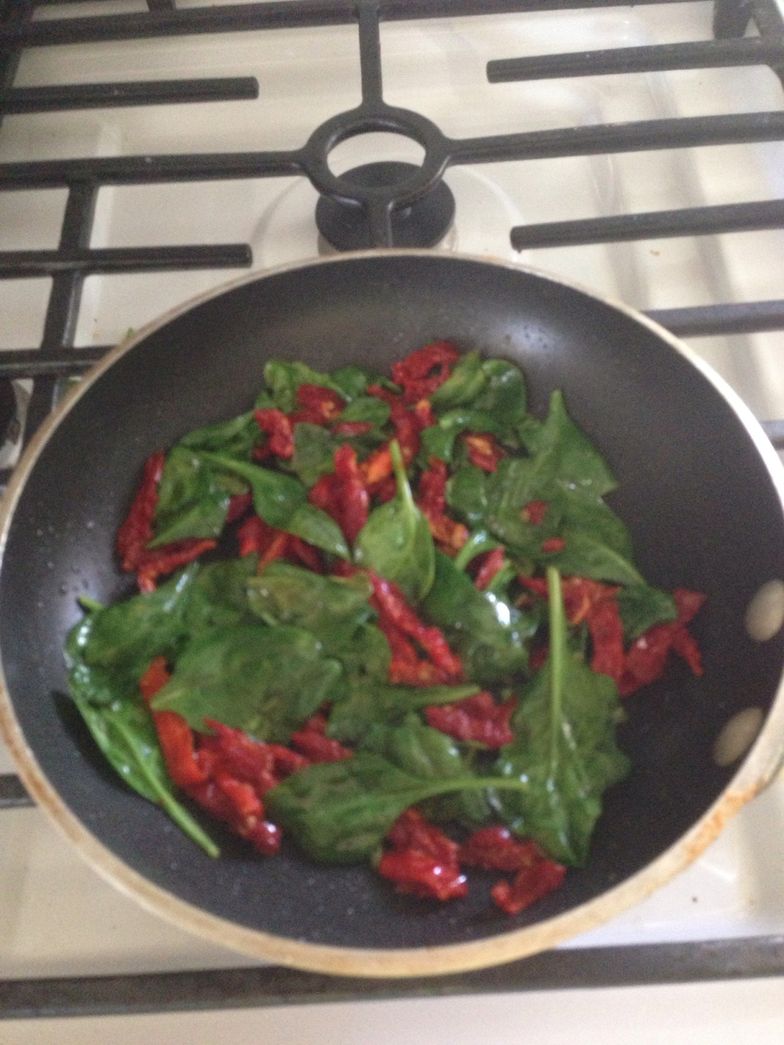 https://guides.brit.co/media-library/melt-butter-add-sundried-tomatoes-and-half-of-spinach-to-pan-saut-u00e9-until-spinach-wilts.jpg?id=23828826&width=784&quality=85