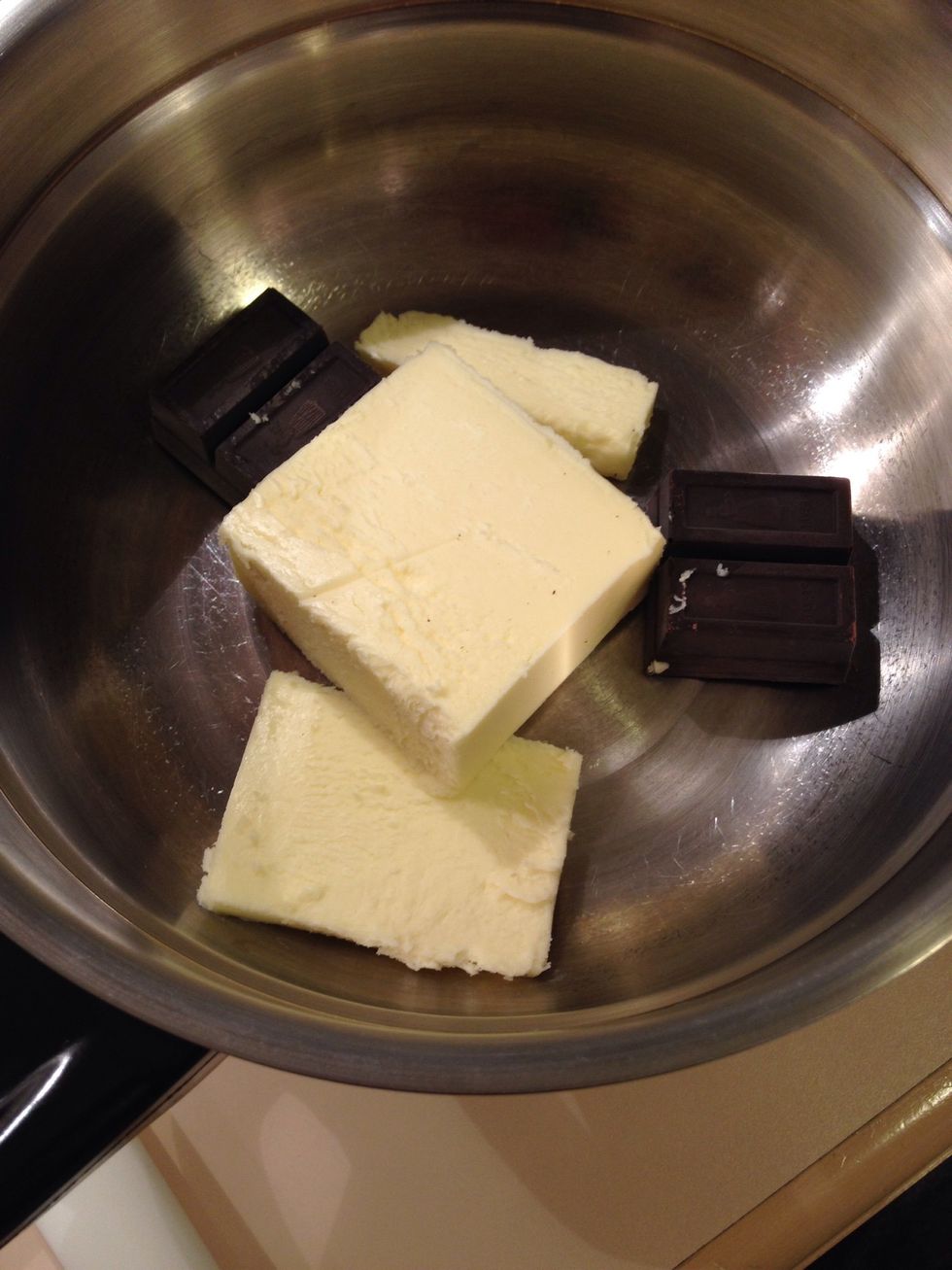 Melt butter and chocolate in double boiler.