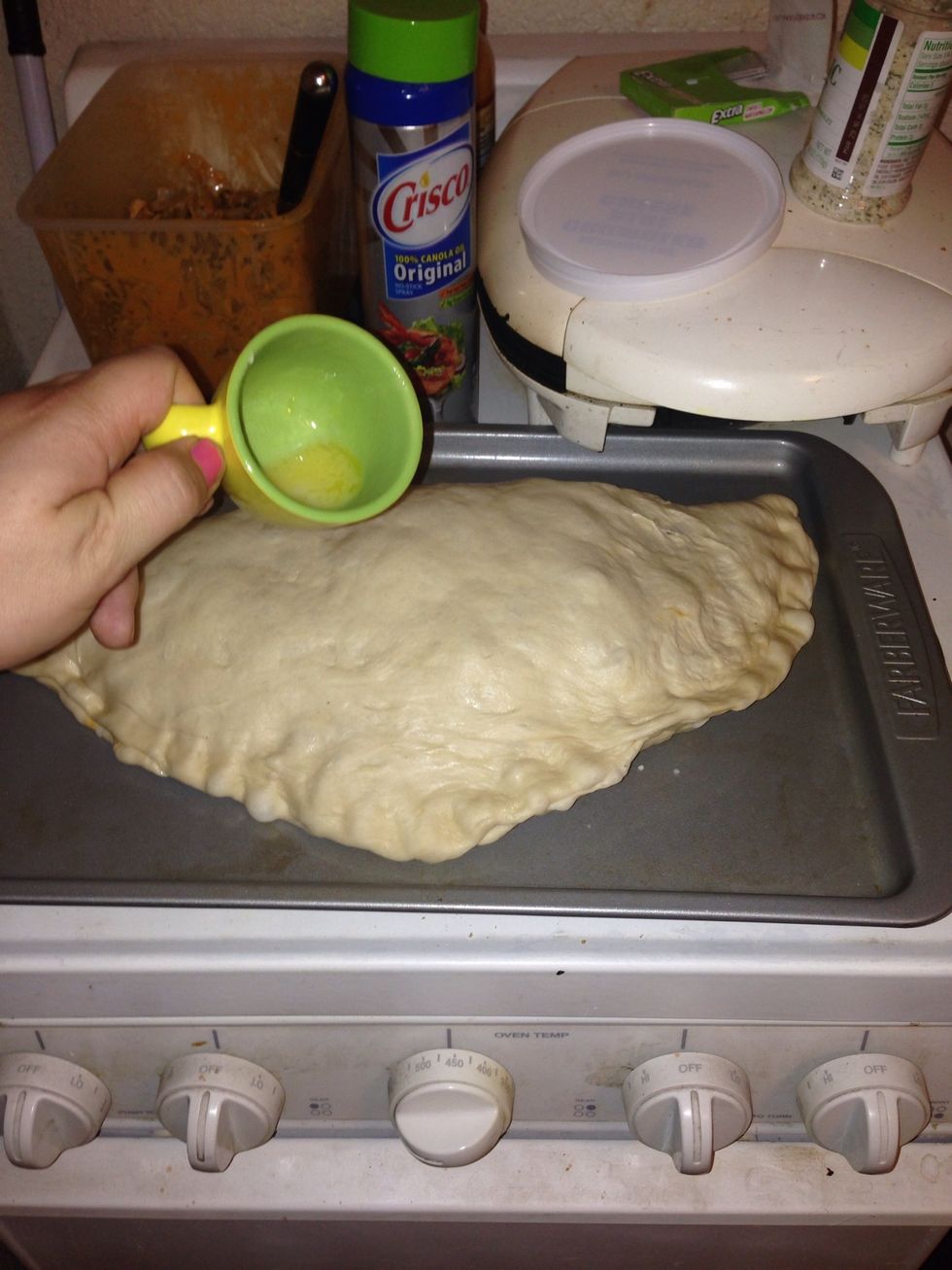 Melt butter and pour over the top