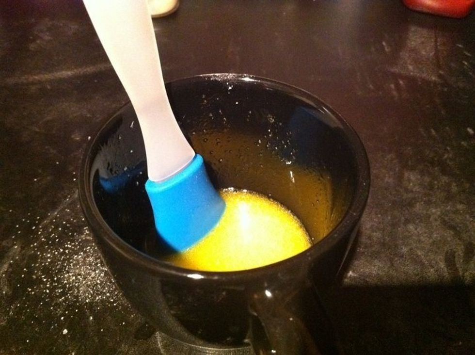 Melt butter in microwave and add garlic salt once removed and stir until dissolved.