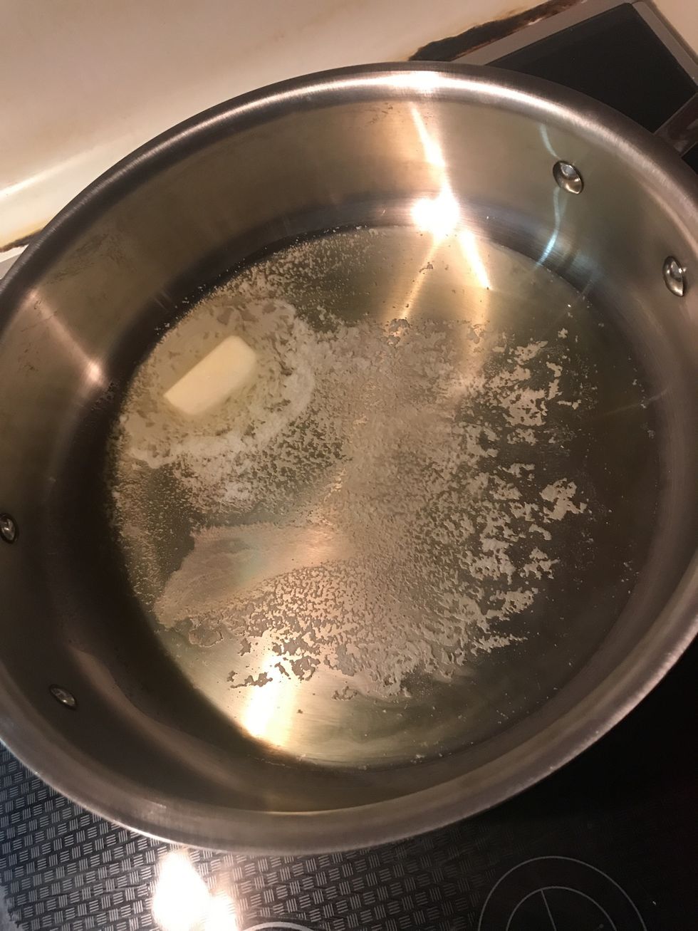 Melt butter in olive oil on medium heat