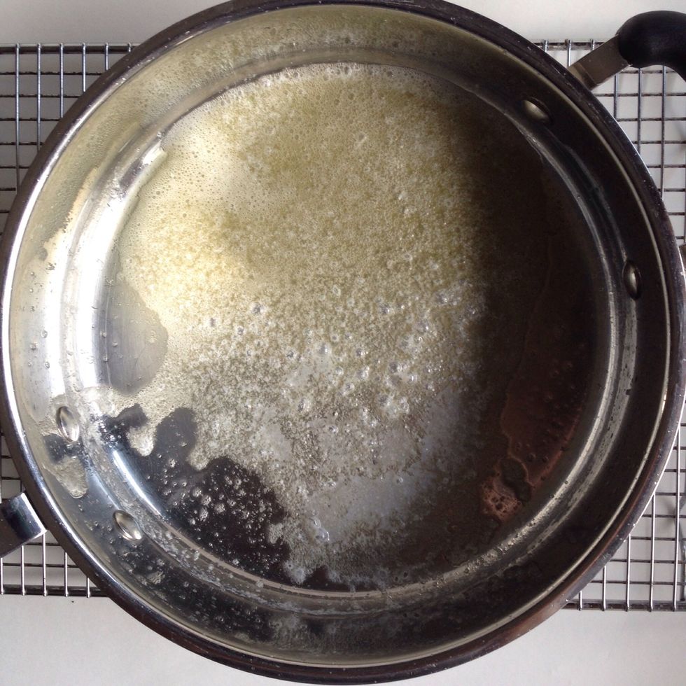Melt butter in saut\u00e9 pan over medium-ish heat.
