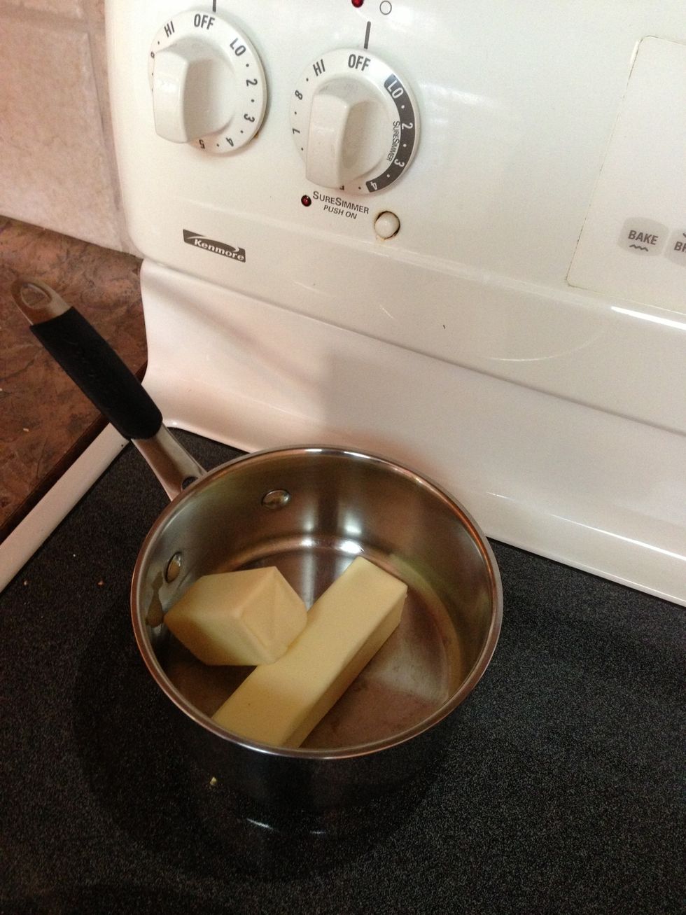 Melt butter in small pan. You can either sprinkle seasonings over stuffing as you mix it, OR stir into the melted butter which you will drizzle over bread cubes.
