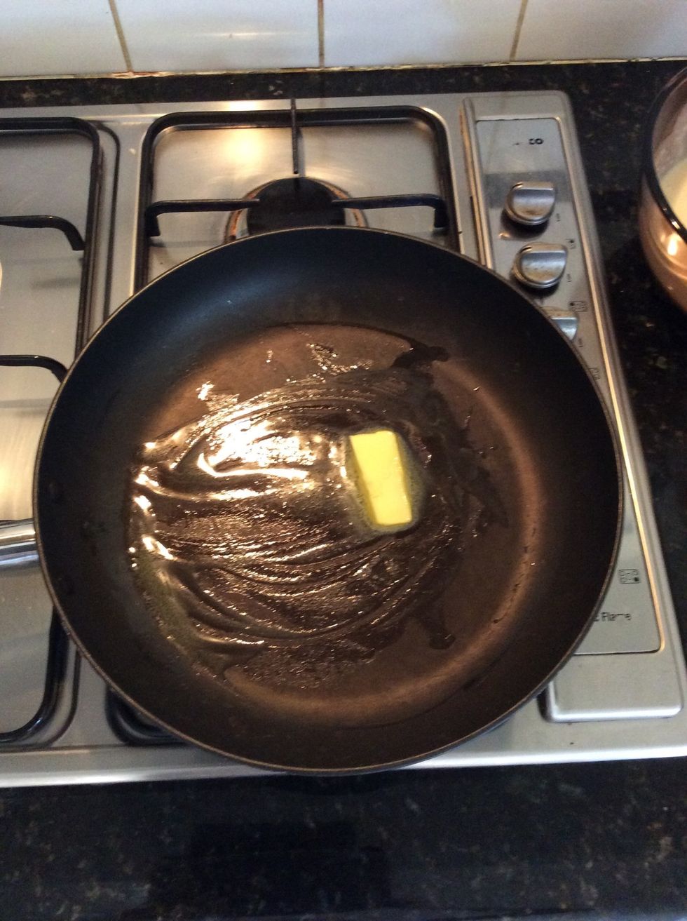 Melt butter over medium heat.