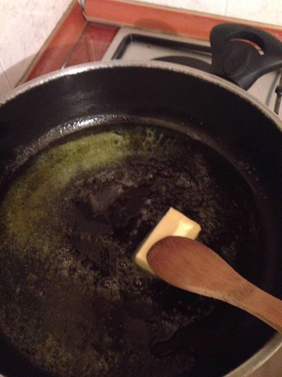 Melt half of the butter in a hot frying pan.