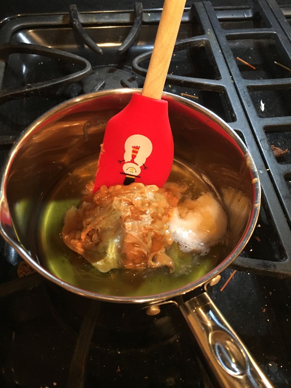 Melt honey, nut butter, and oil in a medium sized pot