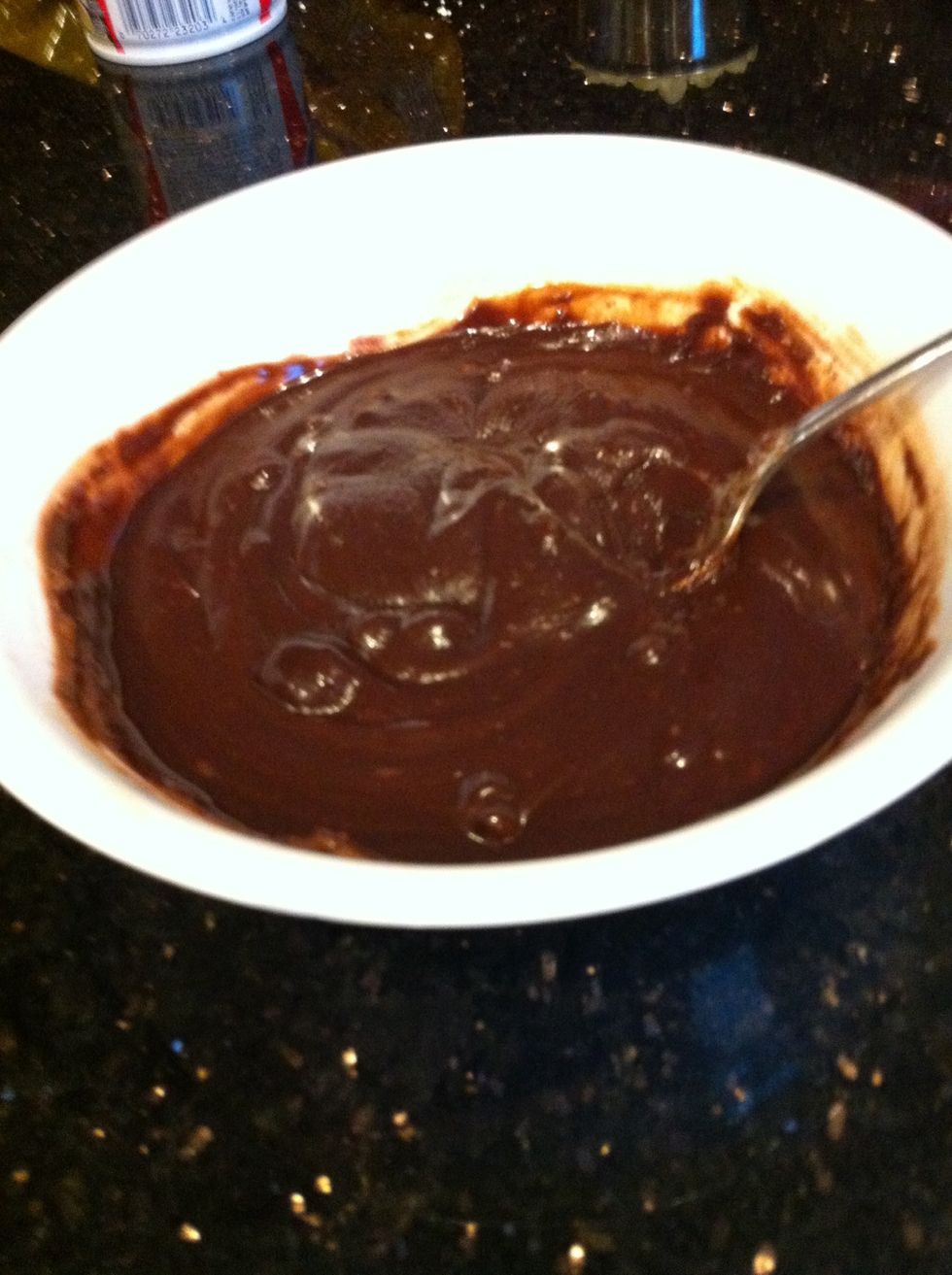 Melt milk chocolate with some whipped cream, milk, and butter