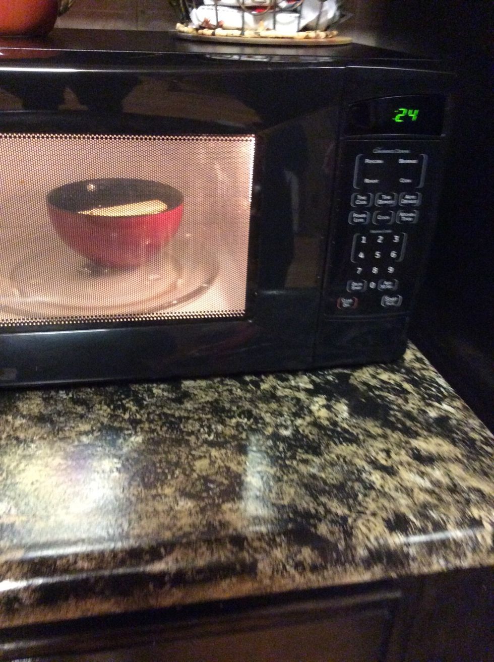 Melt one stick of butter to combine with blended Oreos.