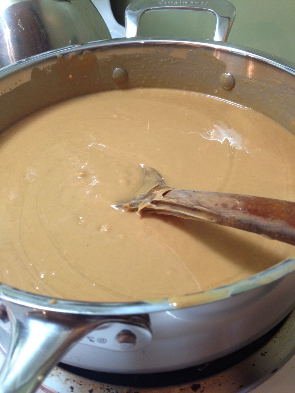 Melt peanut butter, butterscotch chippits and butter together in a sauce pan on medium heat until everything is completely smooth and mixed together.