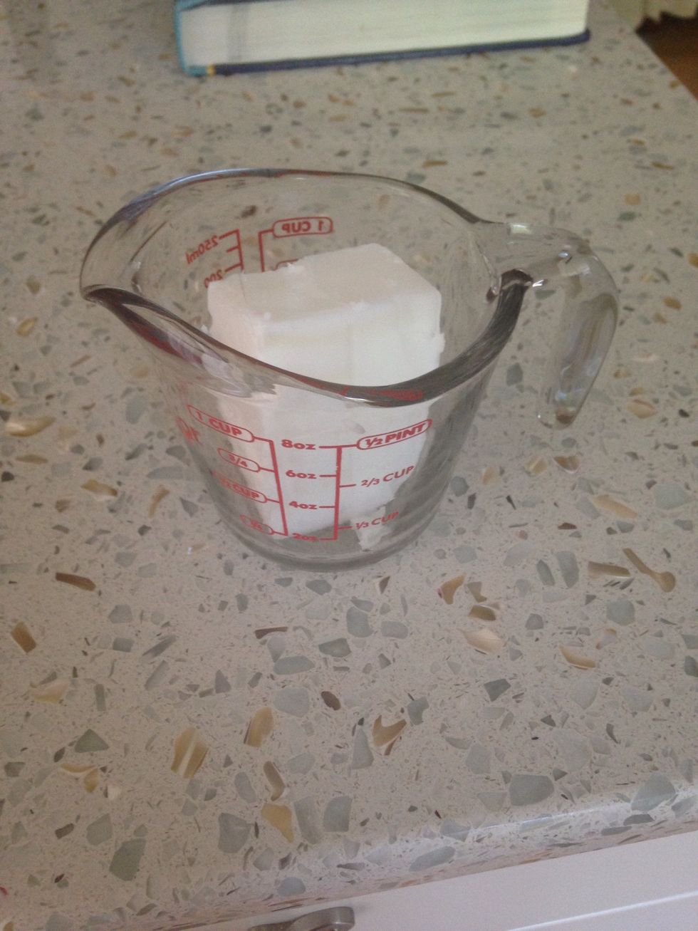 Melt soap in microwave for 20 seconds. Stir. Heat for 10 second intervals stirring in between until melted.